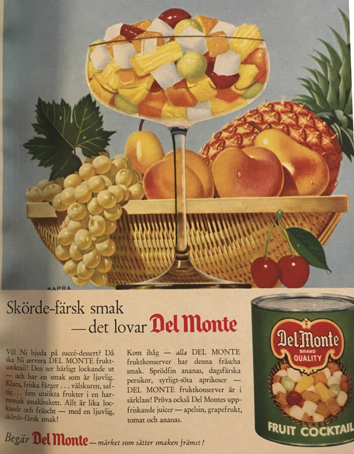 Päron, ananas, druva och persika – men det var ju det lilla röda körsbäret vi alla ville åt. Annonsen för populära fruktcocktail-konserven var införd i Hemmets Veckotidning 1961. Annons för fruktcoctail.