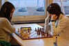 Pias dotter Anna Cramling är en stor profil i schackvärlden. Här syns de två under ett parti i snabbschack-SM för damer 2014, en av få gånger de mötts i en tävling.