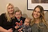 Karin med sin yngste son Liélo, svärdottern Vilma och sonsonen Malwe.