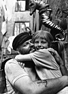 1969- 'Pippi Långstrump på de sju haven'. Pippi, spelad av Inger Nilsson, ger sin pappa i filmen, spelad av Beppe Wolgers, en stor kram sedan hon befriat honom ur sjörövarnas fångenskap.