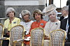 Prinsessan Margaretha, prinsessan Birgitta, prinsessan Désirée och prinsessan Christina uppradade i publiken, när prinsessan Madeleines och Christopher O'Neills dotter prinsessan Adrienne döptes i Drottningholms slottskyrka år 2018.