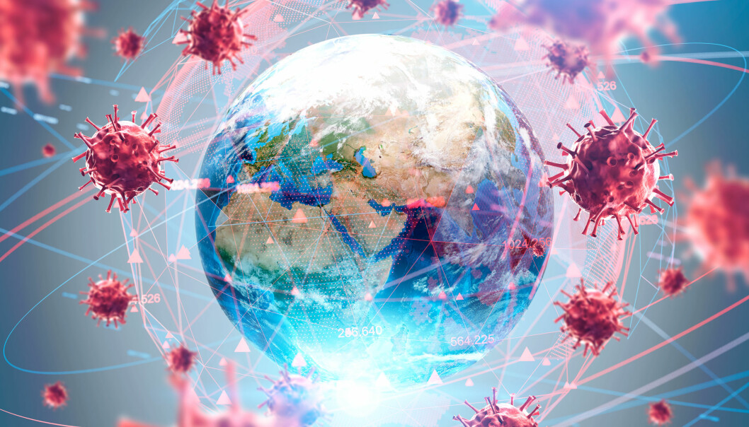 En jordglob med massa coronavirus flygande kring sig för att illustrera den rådande coronapandemin.