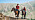 Anders och Lousie rider på varsin häst i bergen i Kargizistan.