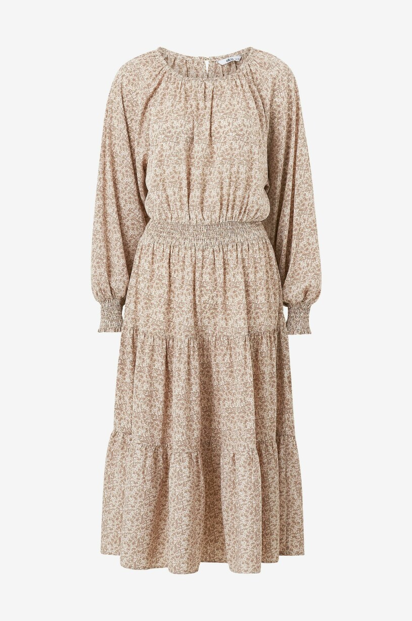 Beige mönstrad klänning