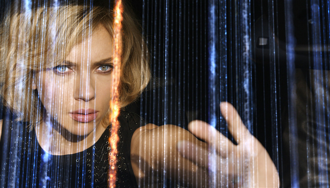 Scarlett Johansen utnyttjar hela hjärnans potential i<i> Lucy</i>. Foto: TT Scarlett Johansen i filmen Lucy från 2014.