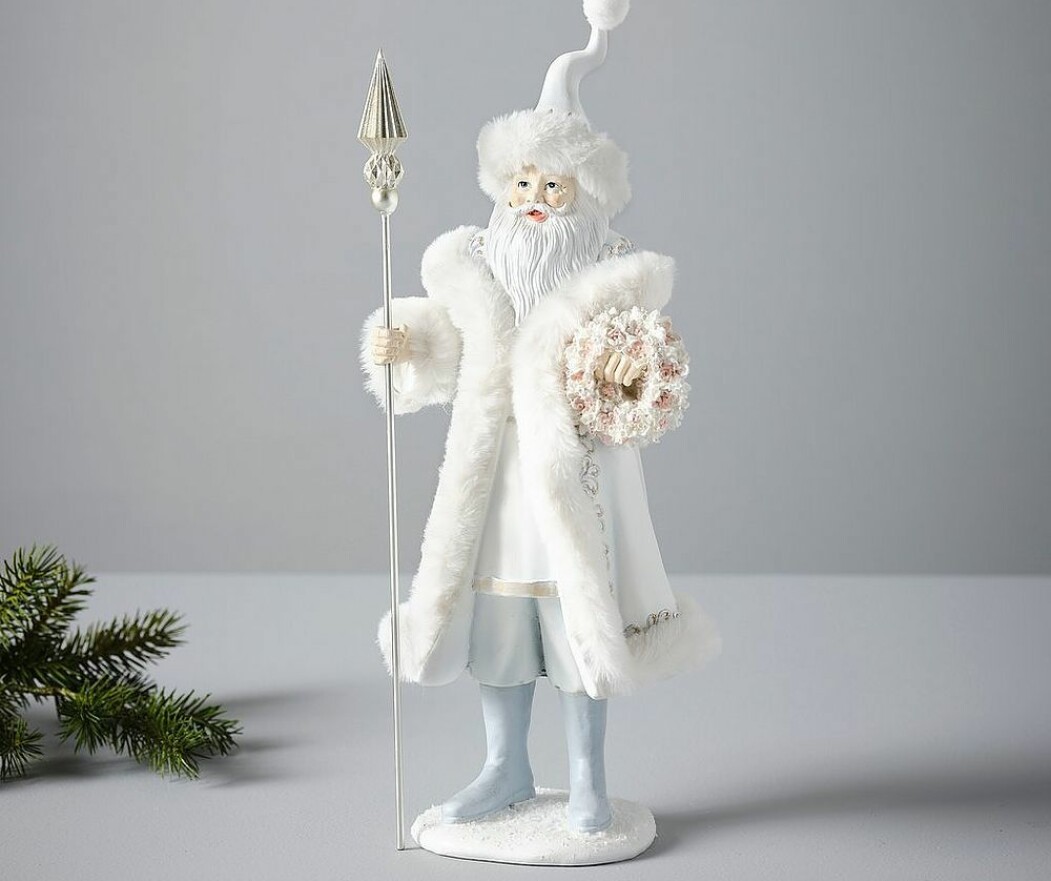 Vit tomte med pälskantad kappa och spira, från Jotex