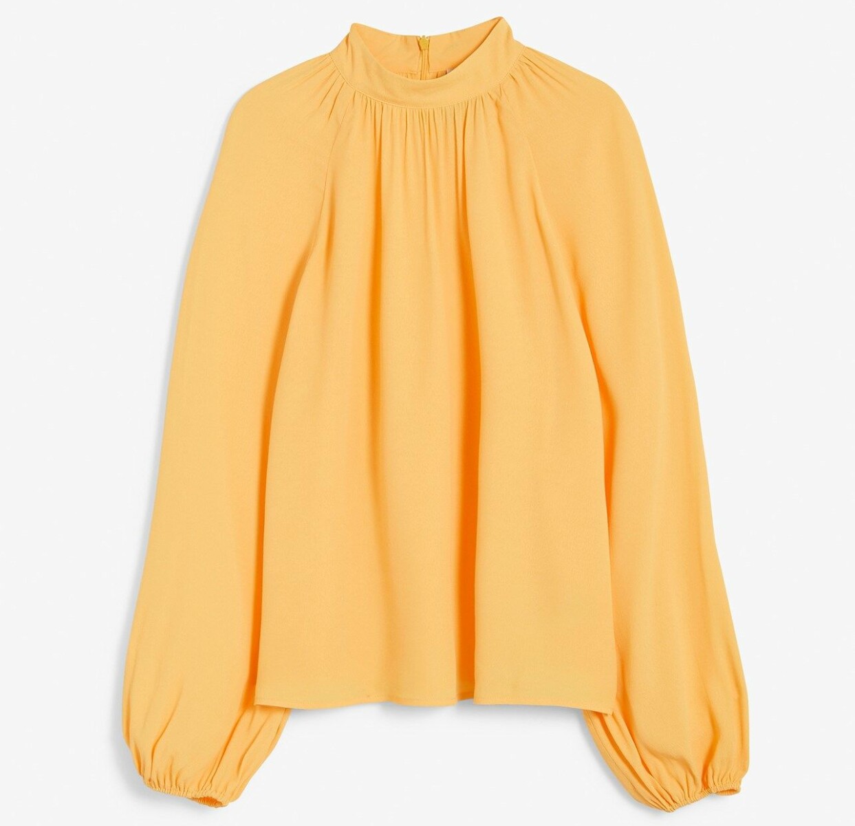 Gul blus med rund hals och puffärm, från KappAhl