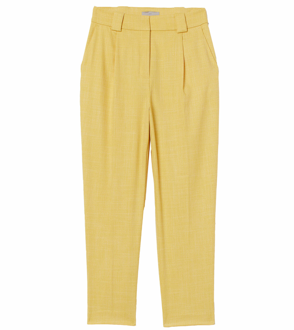 Gula slacks med snedfickor och veck, från H&M.