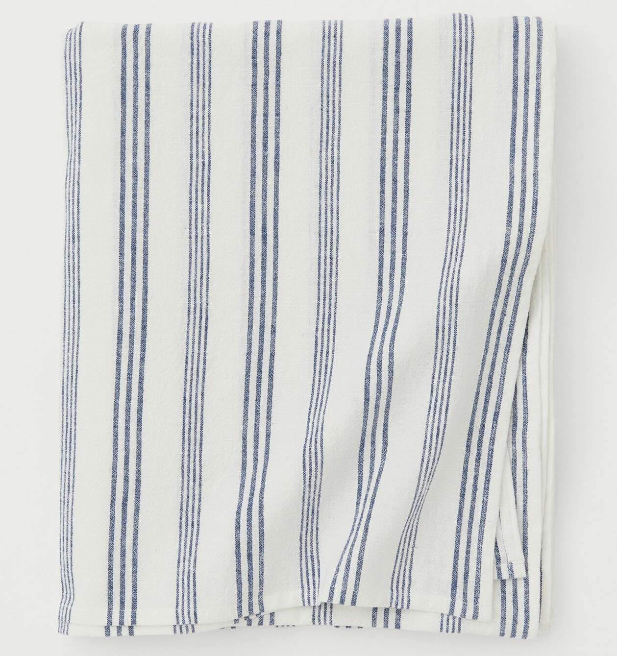 Smalrandig linneduk i blått och vitt, från H&M Home