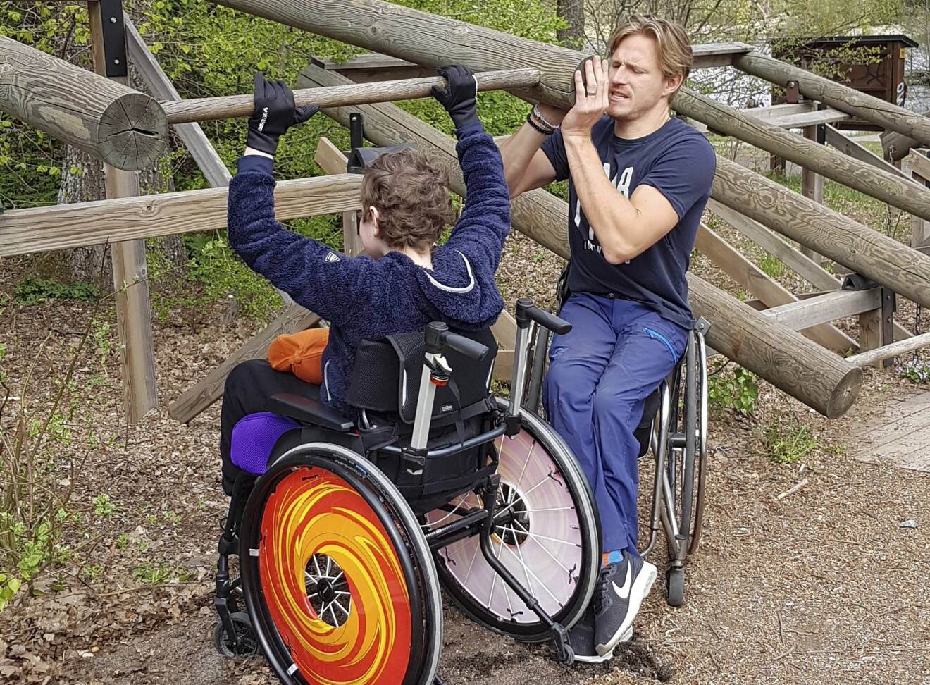 Aron Andersson i rullstol