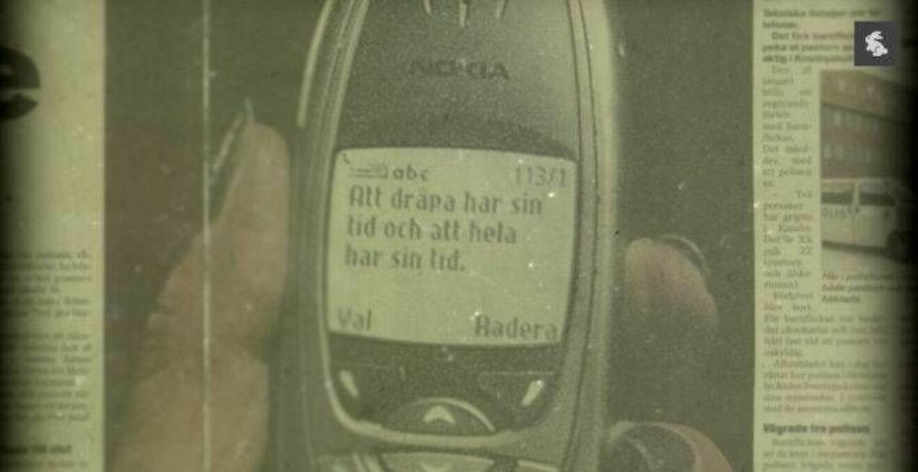 Bild på mobiltelefon i tidningsartikel.