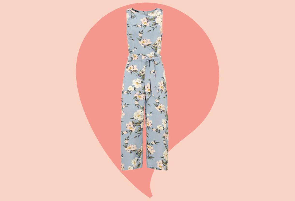Blå byxdress med blomstermönster