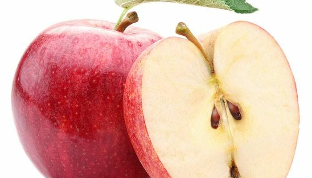 Ett delat rött äpple.