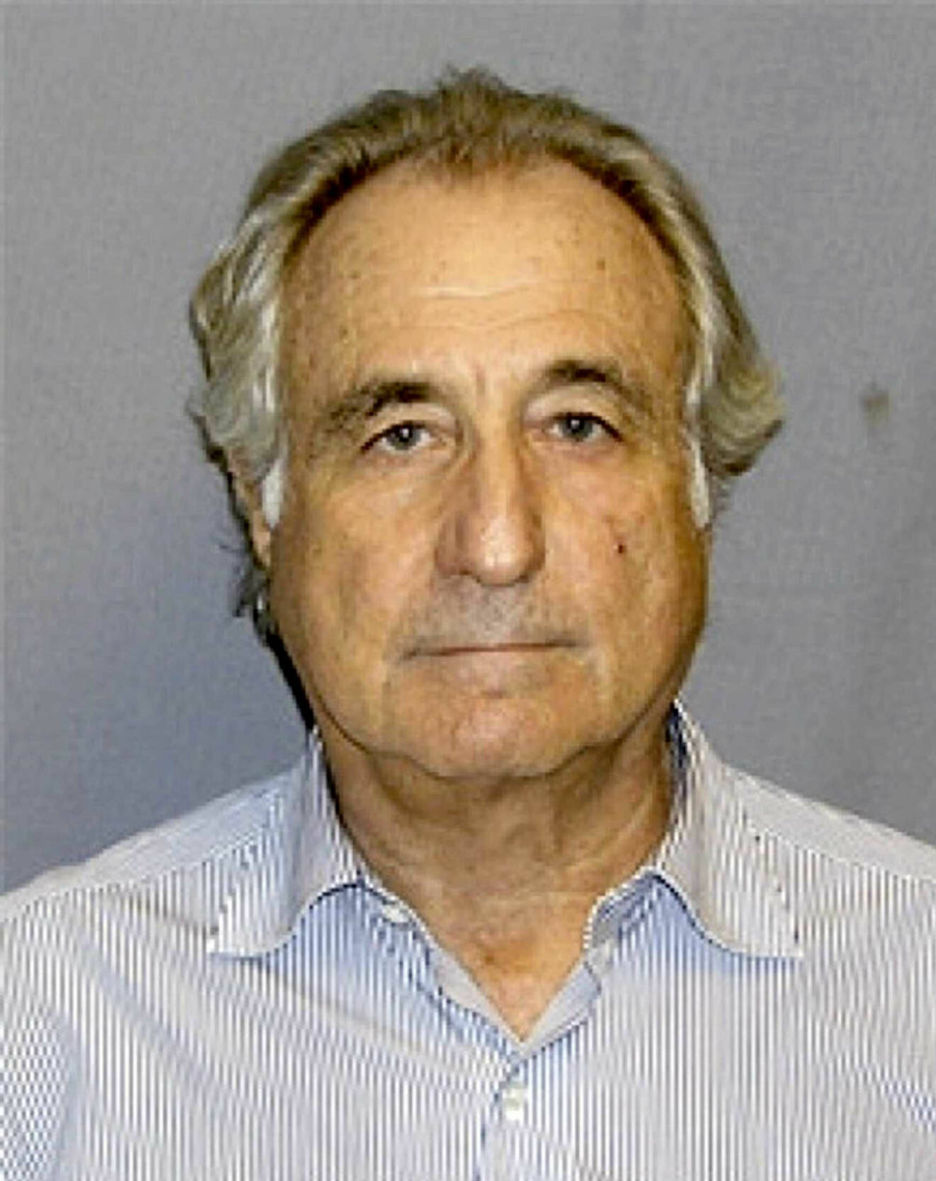 Bernie Madoff i häkte efter att han greps misstänkt för ett bedrägeri i miljardklassen.