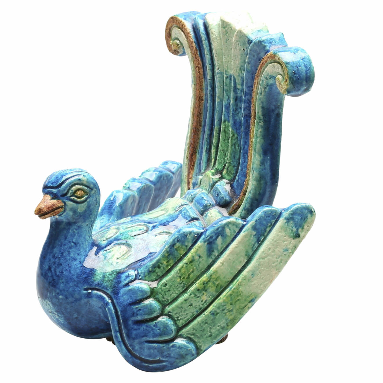 Färglad fågel i keramik.