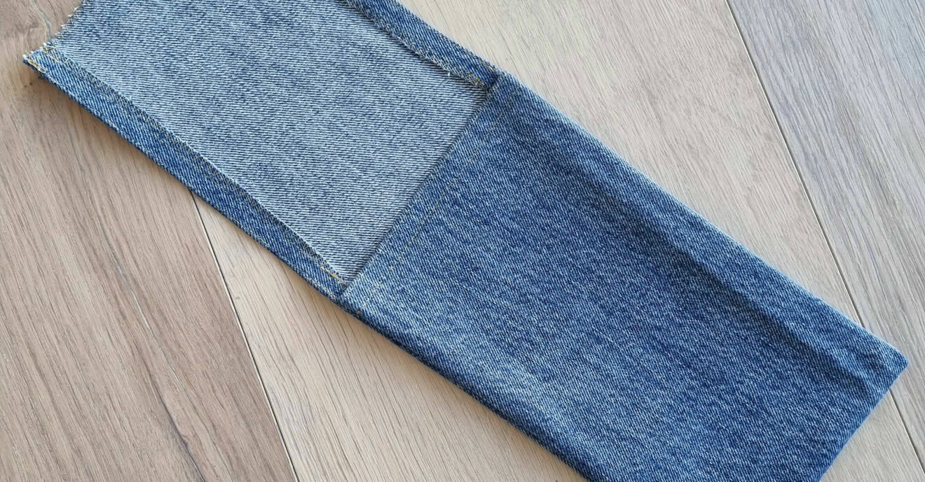 Jeans omsydda till en ficka