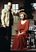 Ingmar Bergman står intill Lena Olin, som sitter på en stol, och måttar med handen över hennes huvud. Det är repetition av Fröken Juli på Dramaten och året är 1991.