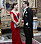 Kronprinsessan Victoria i röd aftonklänning och prins Daniel klädd i frack vid kungamiddagen april 2022