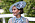 Catherine av Cambridge i en snygg och somrigt håruppsättning med blå hatt