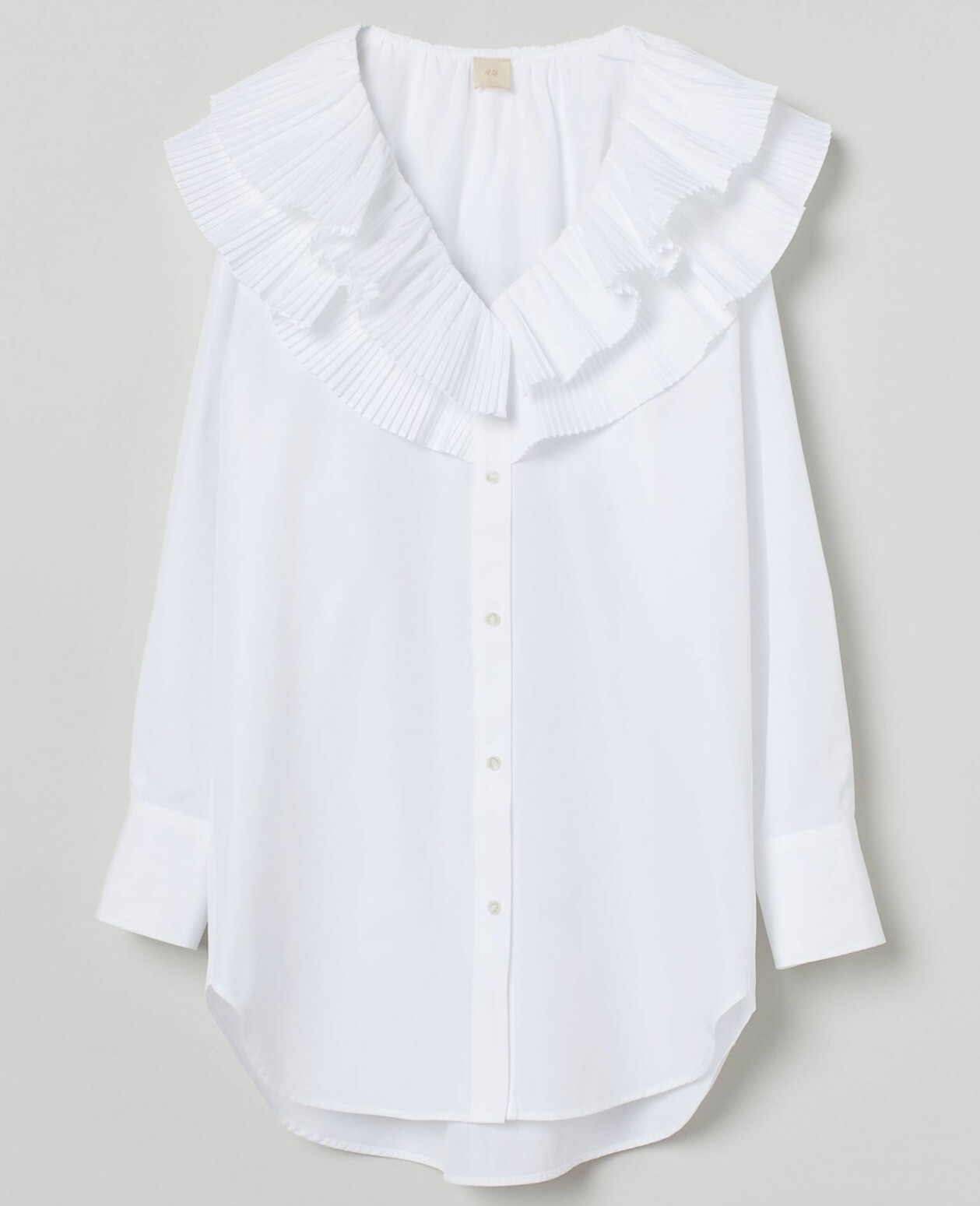 Vit skjorttunika med stor plisserad krage, från H&M